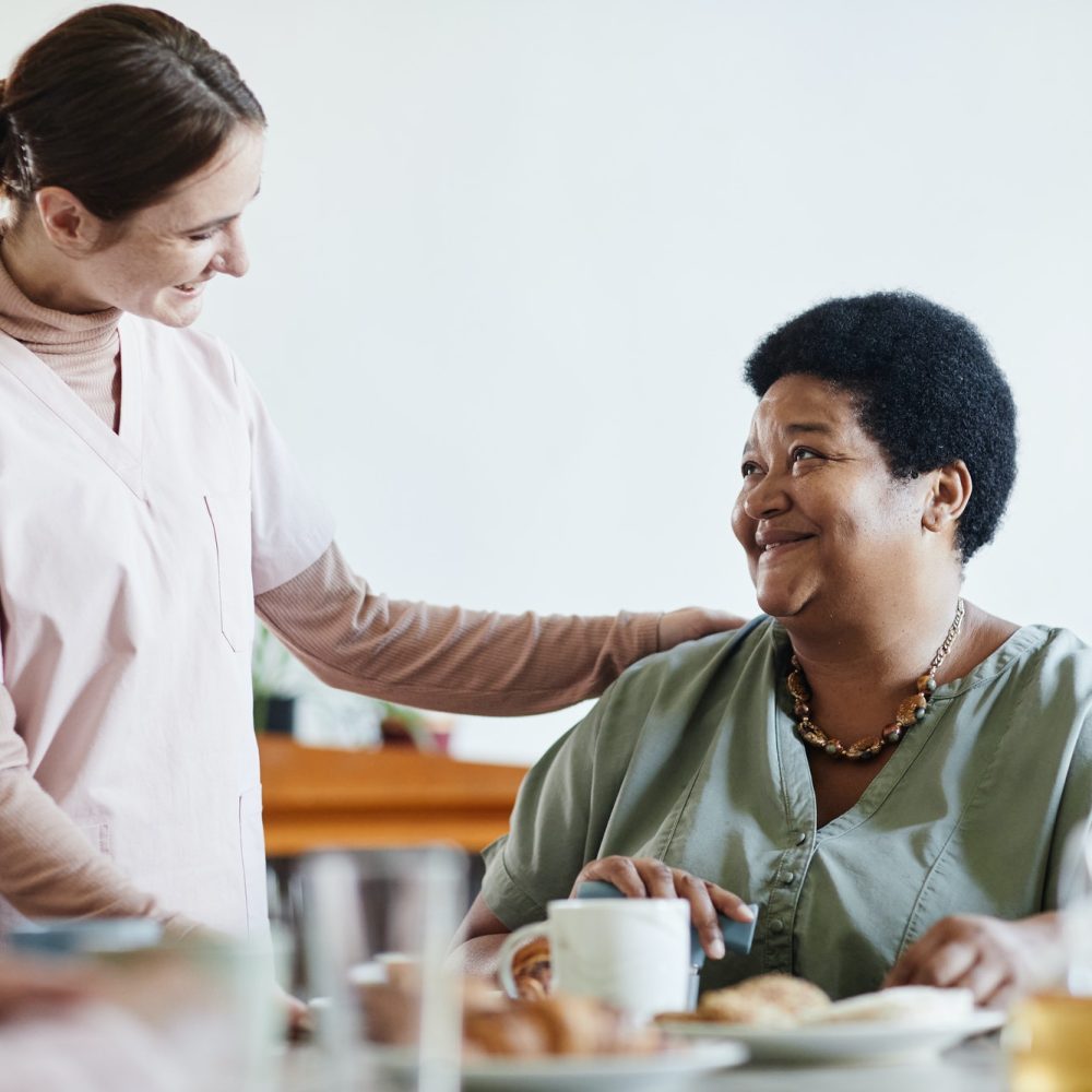 caring-young-woman-working-in-nursing-home.jpg caring-young-woman-working-in-nursing-home.jpg